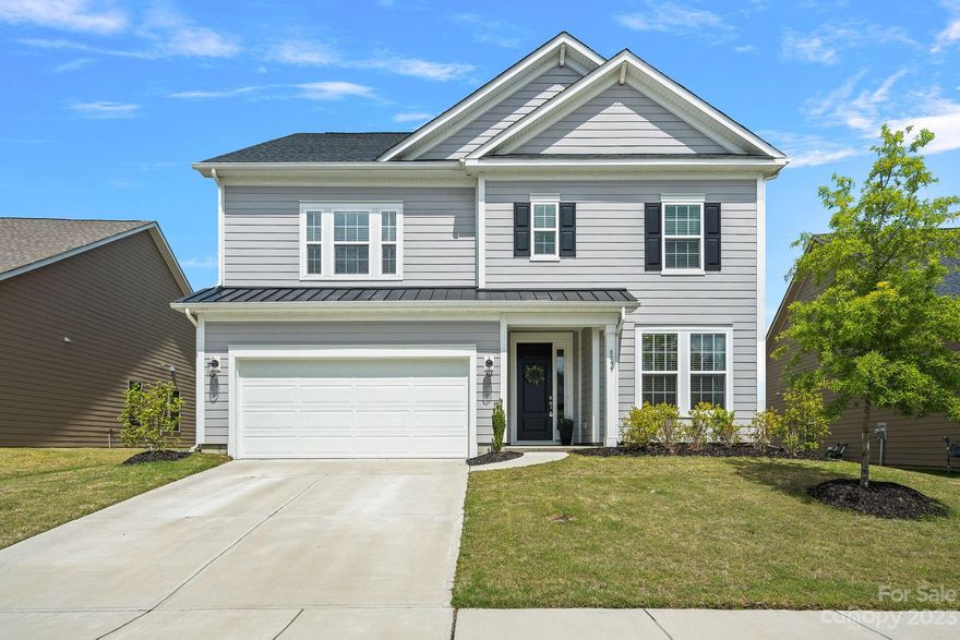 "WOW!" That's what you will say when you tour this home! Enter through the front door and you have a dedicated office/flex room to the right with French doors. The living room is open to the gourmet kitchen and dining area with so much natural light flooding in. The kitchen features white and grey two-toned cabinets with upgraded white quartz countertops, large center island for easy entertaining, gas cooktop with dedicated pot & pan drawer, and SS appliances with wall microwave & oven. This is a chef's kitchen! Also on the main level is an extra flex room that can be a 5th bedroom and a half bath for guests. Upstairs you'll find the large primary suite with dual walk-in closets and a beautiful ensuite bathroom featuring a tiled walk-in shower with frameless door, garden tub and dual vanities. A huge loft, 3 secondary bedrooms, 2 more full baths and laundry complete the upstairs. Out back you'll enjoy the wooded view, fenced in yard and don't forget the community pool in the summer!