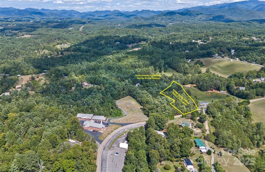 Build your dream home on this beautifully wooded parcel in Rocky Hollow, Weaverville!  This stunning property offers a peaceful, private setting with easy access to local amenities.  Scenic 22 minute drive from bustling downtown Asheville.   With gently rolling terrain and multiple build sites, the possibilities are endless!  Whether you envision a mountain retreat, a homestead, or an investment property, this land is ready for your vision. Enjoy the natural beauty of Western NC, with hiking trails, scenic drives, and charming local shops just minutes away.  No HOA means no restrictions—just pure potential!