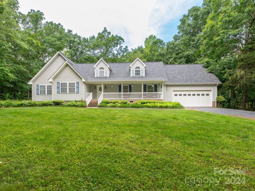 JUST REDUCED!! Location, Location, Location! Beautiful, well maintained home tucked back into the woods with lots of privacy on a private paved road. NO CITY TAX!! Appx 2144sq' upstairs to expand with electrical and plumbing already roughed in. Goodman HVAC 8/2021, Roof Fall 2022, AO Smith Water Softener 2yrs old. Lots of space/storage. Crawlspace encapsulated with dehumidifier done by Clint Miller. Inspected 8/2023. 2 car garage with extra parking beside garage and 50amp plug. Kitchen has oak cabinets, solid surface countertops, tile back splash, recessed lights. Laundry room with cabinets, sink and pantry. Living room with cozy gas logs. Huge dining area. Wide hallway leading to bedrooms/baths. Storage building. 2 Apple trees, 3 Blueberry and 2 blackberry bushes. Relax on the back patio with a great view of the trees. Very private! Covered front porch. Seller owns propane tank. What a great place to call HOME!