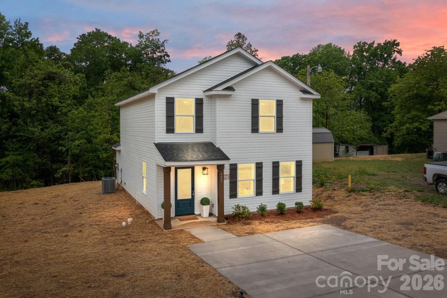 Tucked into a quiet stretch of Cherryville with options for 100% financing, this is the kind of home that first-time buyers hope exists but rarely find—simple on paper, but surprisingly elevated once you step inside. This 3 bed, 2 bath home has been thoughtfully finished well beyond its price point, with clean lines, updated surfaces, and a layout that just makes sense for everyday living. The kitchen and living areas flow easily, giving you a space that feels open without being oversized, and the finishes strike a balance between durable and sharp, so it looks good now and still holds up over time. The bedrooms are comfortably sized, with a primary suite that offers privacy and a functional bath setup that doesn’t feel like an afterthought. Outside, the attached storage building adds real utility—perfect for tools, bikes, or the overflow that always comes with homeownership—without taking away from the yard space. Location-wise, you’re positioned for convenience without the chaos: quick access to everyday essentials in Cherryville, an easy drive to Gastonia for more shopping and dining options, and connectivity to I-85 that puts you within reach of Charlotte when needed. For buyers trying to get out of renting and into something they can actually be proud of, this is a rare opportunity to start with a home that already feels a step ahead.