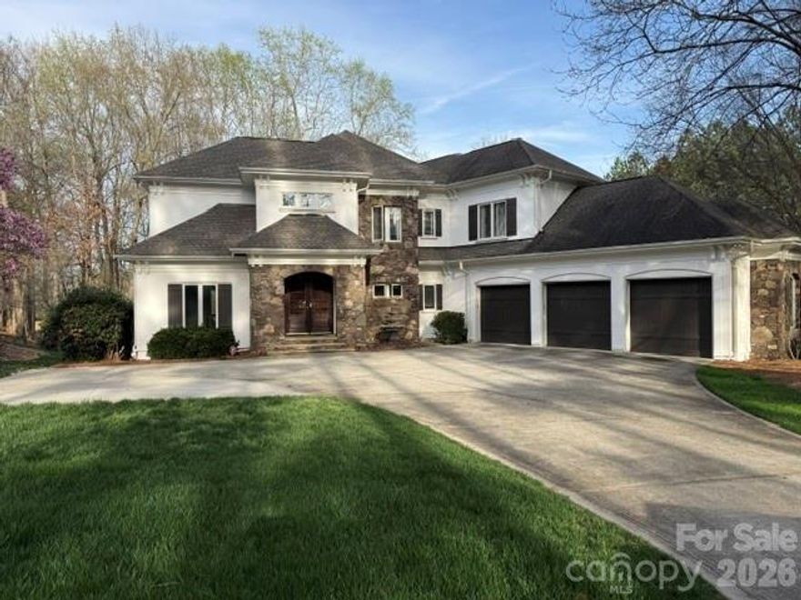 Helms Custom Home overlooking the 14th green and salt water pool, waterfall, and spa.  2 primary suites with custom closets and large spa bathrooms.  Large east facing verandas (upper and lower) perfect for entertaining in the evenings without excessive heat in summer.  Windows Galore!!!  New kitchen remodel 2021, new exterior paint and trim 2026.  9ft custom interior doors throughout, exquisite trim throughout, all bedrooms are suites, and all closets professionally outfitted with custom finishes.  The kitchen has huge walk in pantry and expansion area in oversized breakfast room/area.