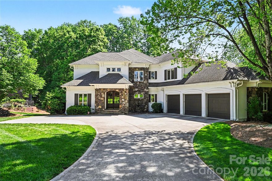 Helms Custom Home overlooking the 14th green and salt water pool, waterfall, and spa. The backyard is fenced and has resort feel with covered veranda, pool deck, and golf course views.  2 primary suites with custom closets and large spa bathrooms.  Large east facing verandas (upper and lower) perfect for entertaining in the evenings without excessive heat in summer.  Windows Galore!!!  New exterior and interior paint 2026.  9ft custom interior doors throughout, exquisite trim throughout, all bedrooms suites, and all closets professionally outfitted with custom finishes.  The kitchen has huge walk in pantry and expansion area in oversized breakfast room/area.