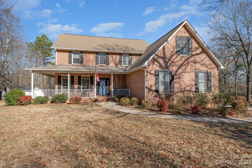 This beautiful, established neighborhood is highly sought-after for its charm and
desirability. With its well-maintained homes and picturesque surroundings, it exudes a
timeless appeal. The home is adorned with a charming wrap-around porch providing an ideal spot
for soaking in the scenic surroundings and enjoying quiet evenings. Home has been updated with new carpet and fresh paint. The large deck presents a perfect vantage point overlooking the fenced-in backyard, creating an inviting space for outdoor relaxation and entertainment. This home features a spacious private bonus room, which can be utilized for various purposes, and a cozy office space that provides a comfortable environment for working from home. The shed at the rear of the property has ample storage and also has space for a small boat or riding lawnmower.  Enjoy the convenience of an easy commute to Charlotte,
with the residence located just off of I-77.