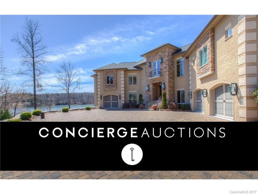 NO RESERVE AUCTION!!  Open Daily 1:00-4:00pm! AUCTION April 27th! **(REGISTRATION DEADLINE April 25th)** Perfectly situated on a peninsula, this stunning estate offers breathtaking panoramic views of Lake Norman and the State Park from nearly every room. With over 9,000 square feet, this contemporary masterpiece is grand in space and masterfully designed throughout, including the gourmet kitchen, an in-home gym with a sauna, and a lower level leading to Lake Norman.