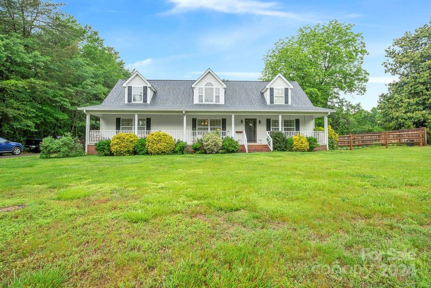 Welcome to this well maintained 3 bedroom, 3 bath homestead on .97 acres of usable, flat property. The yard offers of two sheds, a chicken coup, chicken run, chicken tractor & fenced garden area which allows you to be self-sufficient by growing & preserving your own foods. Behind this property (seperate owner) the finishing touches are being put on a beautiful horse pasture & pond which will provide a picturesque view from your 12x32 deck. The main level of this home consists of a kitchen w center island that opens to the dining area and spacious living room. The split floor plan has the primary bedroom w en-suit on one side and two additional bedrooms & full bath on the other. Upstairs you will find a family room, full bath & two additional bonus rooms/potential bedrooms (1 w/ closet) making this potentially a 5 bedroom home. Updates inc a newer roof, shed, well pump, stair carpet, fence & more. Located just down the road to Lake Norman State Park w no HOA & plenty of driveway parking