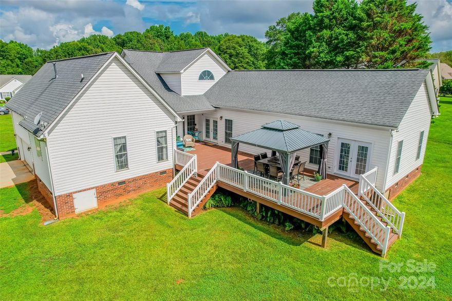 Wow! Check out this beautifully maintained ranch home located in the lovely community of Willow Creek! Original owners put a lot of love into this home, the addition was added on in 2003, and additional renovations done in 2016. Sitting on an acre, enjoy those Carolina sunrises with a cup of coffee sitting on your large back deck with gazebo. Very private, store your boat or motorhome in your 40x 16 powered carport/pole building. Open concept, beautifully remolded primary bath and secondary bathrooms. Home office and large living space with bar for all your entertainment needs! All furniture is negotiable. Close to lake Wylie and the heart of Clover. Award winning Clover Schools. If you are looking for a little bit of land and no HOA, look no further, this home is a must see!