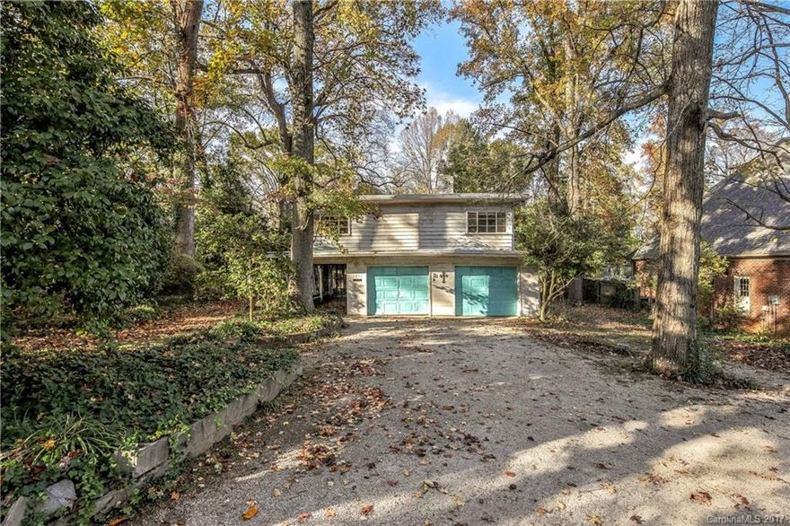 Great opportunity to build your own home in sought after area! With over half an acre on a flat yard, this is the perfect rehab/renovation or rebuild project! Walking distance to the shopping and dining at Park Road Shopping Center. Home will be sold in as-is condition.