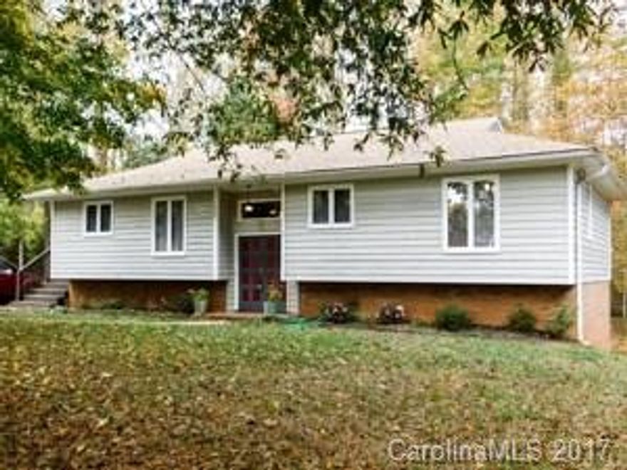 Recently Renovated from Top to Bottom.  Beautiful move-in ready in quiet and peaceful Waverly Subdivision.  Mature trees in back yard for privacy.  All new laminate flooring throughout main (real hardwoods in back bedroom); new paint throughout, new appliances, countertops, painted cabinets; great living room with built-ins, tile bathrooms, large closets, plenty of storage.  Basement for playroom, recreation, and tons of storage.  Large deck on back rebuilt and painted.