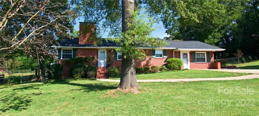 Wonderful brick ranch in desirable NW Hickory neighborhood close to schools, shopping and restaurants.  Home has had numerous updates including, kitchen cabinets, flooring, fencing, roof, PEX plumbing, bathroom and HVAC.  Living room features a beautiful wood burning fireplace and hardwood flooring. Dining room off the living room offers an open but spacious area for family meals. The den is ready to claim as your new in home office or additional living space.  Patio in back offers a private feel with room to entertain around the built in firepit. Just completed fenced in back yard is ideal for pets. Home is being sold as is where is.