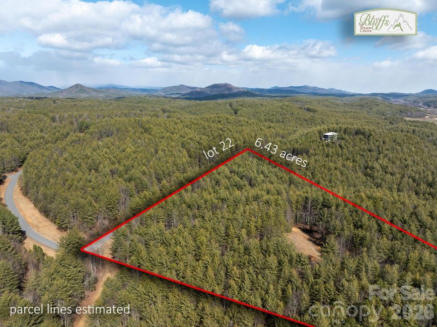 Exceptional 6.43-acre vacant lot located in the highly desirable community of The Bluffs of Wilson Creek. This property offers a prepared building site with an existing cleared area and circular driveway, providing convenient access and an excellent foundation for future construction.
The lot offers substantial privacy with a wooded setting and frequent wildlife sightings. The property is situated near natural amenities, including the Johns River and surrounding conservation areas, providing easy access to outdoor recreation.
A valid septic permit for a 4-bedroom residence is in place. A natural fault line runs through the property, offering favorable conditions for well installation and high-quality water.
This lot presents a strong opportunity for buyers seeking acreage, privacy, and proximity to natural environments within a premier mountain community. Suitable for a primary residence, vacation home, or long-term investment.
Lot #23 is also for sale. Consideration will be given if both lots are purchased together.