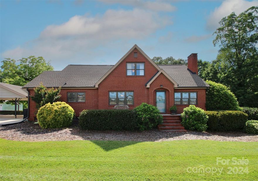 Welcome to 33217 Old Salisbury Road, a well-cared for home on over 4 acres in northern Stanly County. Nestled amidst serene surroundings, this property offers a tranquil retreat away from the hustle and bustle of city life. Fully remodeled, the main level boasts beautiful original oak flooring, a sizable primary suite with study, and kitchen with granite countertops and stainless steel appliances. Upstairs, you’ll find two generously sized bedrooms, a full bath, and storage space that dreams are made of. The basement is perfect for entertaining, featuring stained concrete flooring, a fireplace and wet bar, as well as an added half bath. Take advantage of the additional unfinished basement space for more storage or finish out to suit your needs.