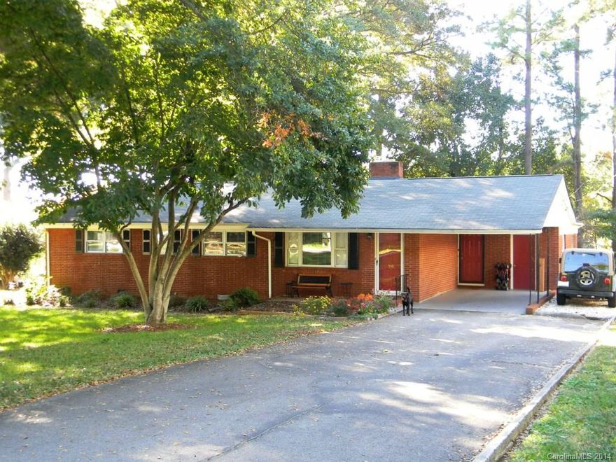 Charming living space that flows openly into den and sunroom from a newly remodeled kitchen w/glass front cabinetry, beautiful granite and tile backsplash. Large level back yard and patio extends all your living space to the outdoors, and area swim/tennis club is just around the corner! This home has original hardwood floors along with laminate and tile flooring. Roof, water heater and HVAC recently replaced.