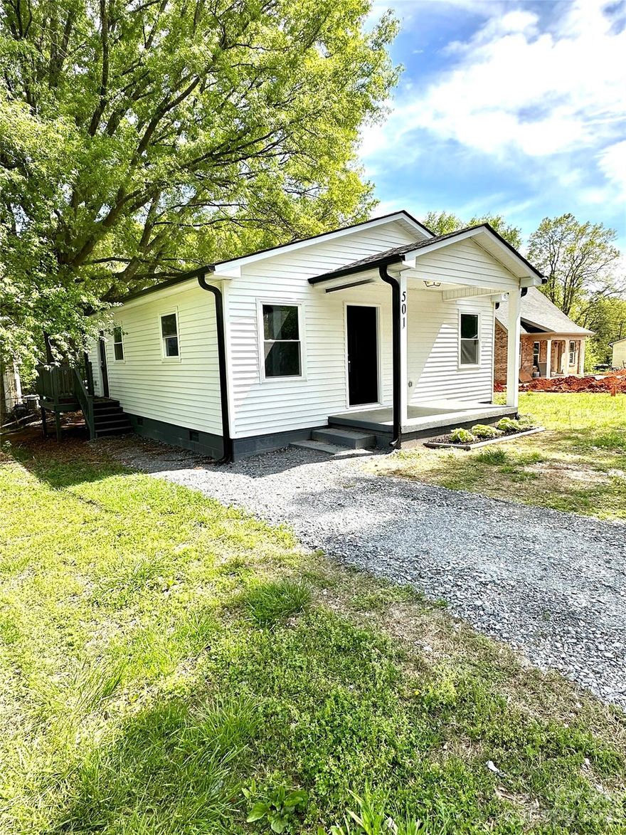 Located only 7 minutes from Crowders Mountain State Park, 10 minutes to the Two Kings casino, 10 minutes to Gastonia and 35 minutes from Uptown Charlotte.  You will love all of the New Recent Renovations to include:  Roof, Siding, Gutters, Windows, Side Porch, Hot Water Heater, HVAC, Bathroom Tub, Flooring, Paint, Doors, Lighting, Granite Countertops, Soft Close Cabinets and Appliances.  Bessemer City Middle School is just down the road and Bessemer City Park is just around the corner.