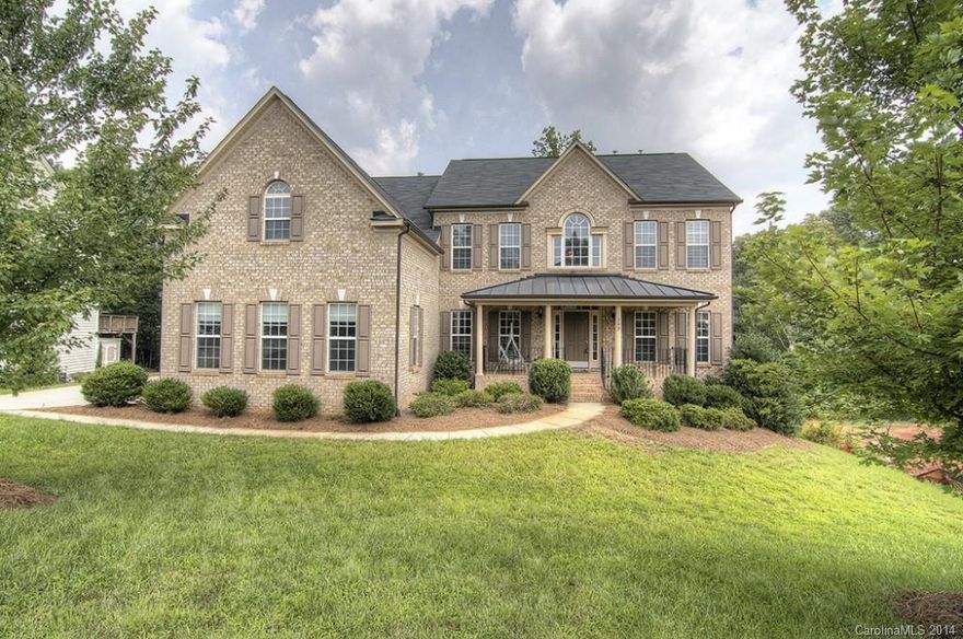 Spacious home, nicely updated, finished basement. Large living spaces w possibilities for work, play & relaxation. Gorgeous two story great room w beautiful wall of windows, gourmet kitchen, formals, flex room can be an office/hobby room. Walk-out basement offers Full Media room w projector screen/surround sound, study/exercise room, full bath, open space for pool table, bonus room & more. Perfect home for entertaining! Motivated seller, bring offers! Fort Mill Schools, close to everything.