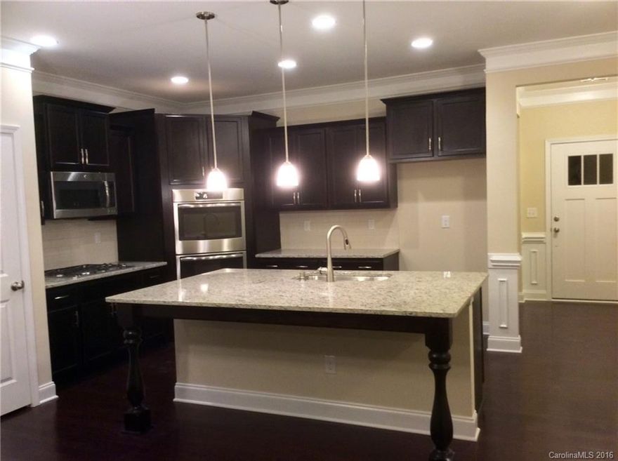 Stunning ranch home with a total of 4 bedrooms, 3 bath and a loft. Gorgeous main level with an open layout. Best of all this ranch called "The Marigold" has an additional flex space that can be used as your lifestyle demands. The perfect kitchen with gas range, stainless appliance and gorgeous ceramic tile backsplash! Extensive hardwoods, fireplace and tons of trim detail.