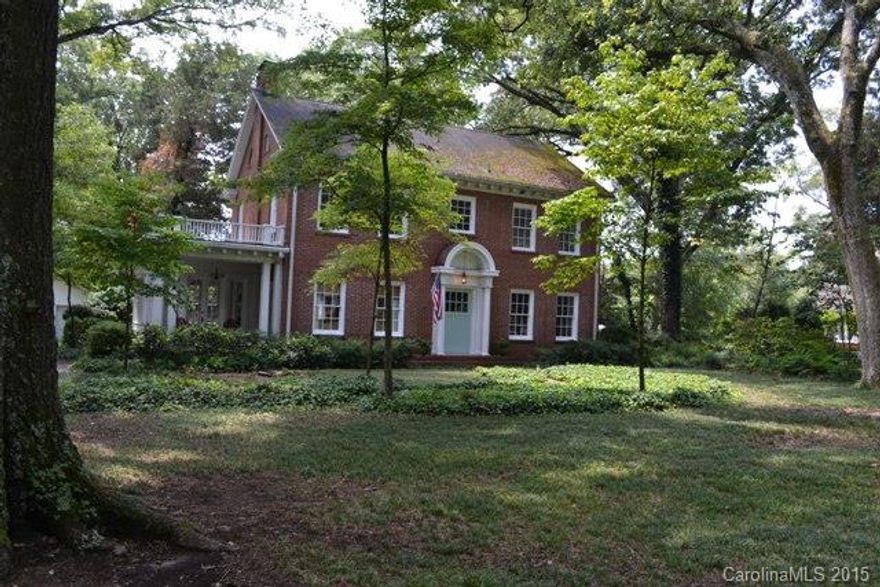 Beautiful updated home on one of Rock Hill's best streets.  So much charm and character.  Every room in this home is large!  Formal dining room, extra wide front door and foyer!  Living room has a fireplace, updated granite kitchen with subway tile back splash and a unique breakfast nook. Gorgeous hardwood floors throughout and amazing light fixtures.  Bright and cheery sun room and a side porch.  Fenced back yard and detached double garage.  A pleasure to show!