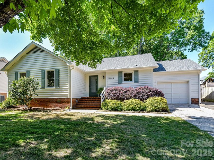 Charming, turn-key, and perfectly located, this 3 bedroom, 2 bath ranch located in Park Ridge offers a combination of comfort and convenience in the heart of South Charlotte. Conveniently located near Ballantyne, McMullen Creek and Sugar Creek Greenways, Atrium Pineville Hospital, and a variety of shops and restaurants. At the heart of the home, you’ll find an open-concept kitchen and living room with a dining nook and brand new white oak-look LVP flooring. The kitchen is a standout, featuring white quartz countertops, brushed gold hardware, and brand-name stainless steel appliances including a Bosch dishwasher, Samsung range, and an LG refrigerator. The primary suite overlooks the backyard and features an adjoining full bath and walk-in closet. Enjoy a private haven in the spacious fenced backyard with a screened-in porch and sizable deck designed for entertaining or simply enjoying time at home. Maximize your space with a garage that includes an interior storage room and a convenient rear exit to the backyard - perfect for the organized homeowner. Peace of mind comes standard with HVAC updated in 2022.