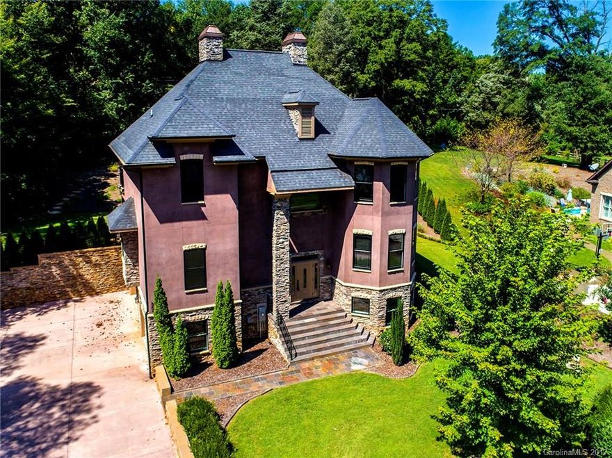 Amazing custom home in the lakefront community of Harbortowne. With this home you get access to the PRIVATE Harbortowne Marina and boat ramp. This home features 4 bedrooms, 4 bathrooms, and a open gourmet kitchen with a dumb waiter! Hardwood and tile floors in all living areas. Kitchen features a commercial size side by side fridge and a huge range/oven. Basement is fully finished and wired in with the rest of the home with A/V cables. Walking distance to Harbortowne Marina. No city taxes!