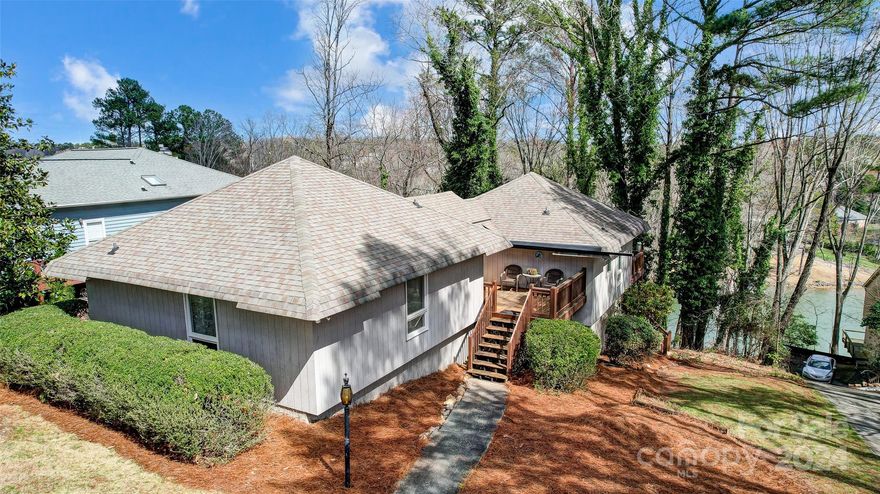 Unlock the potential for your ideal lakeside living with this unique opportunity. Spanning approximately a half acre across two parcels, this property is situated in the sought-after Tega Cay Peninsula. The existing 3-bedroom home exudes a charming cottage atmosphere, awaiting your personal touch. A dock permit is approved, offering the promise of waterfront enjoyment. Bring your vision to life and embrace the vacation lifestyle Tega Cay has to offer, including access to the lake, golf course, marina, walking trails, parks, sports programs, concerts, festivals, pickle ball, tennis and more. Zoned to the award-winning Fort Mill Schools, this property presents endless possibilities for creating your dream lake retreat.
Listing also includes 2005 Marquesas Ave - Parcel ID 641-02-01-005