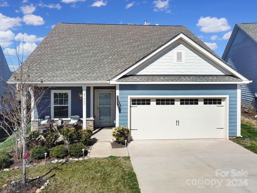 Imagine living the vacation life in this amenity-rich, lakeside/golf community of Edgewater!  This immaculate move-in ready 2BR/2BA home features an open floorplan, large kitchen island and comes w/ stainless appliances, quartz countertops, gas range w/ oven & upgraded cabinets w/pantry.   Come see what this community has to offer - marina w/ boat slips, RV storage, golf course, pool, tennis/pickelball, lakeside pavilion, firepit, bocce ball and rec center with an activity calendar each month!  Coming soon! New 9-hole golf course, clubhouse, pickelball courts and much more.

Relax with friends and family from your covered porch or while grilling on your attached deck.  You will love the large back yard complete with metal fencing.  Why wait on new construction when you begin enjoy a relaxing, easy lifestyle now? HOA on this home includes lawn maintenance and trash pickup so don't hesitate. Schedule an appointment now and  so you can enjoy all the luxuries of this lovely neighborhood.