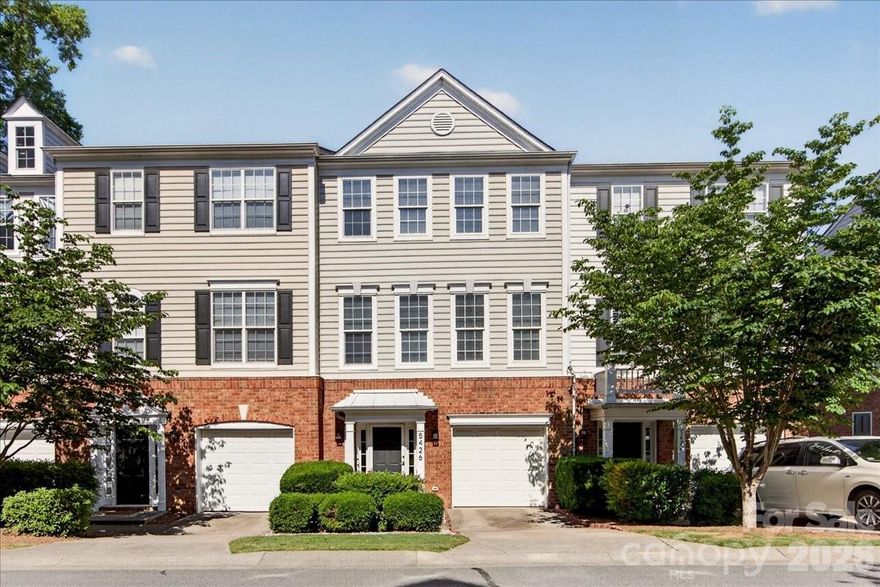 Welcome to Magnolia Park, located in South Charlotte just minutes from SouthPark and Park Road Shopping Center, with easy access to the Little Sugar Creek Greenway, shopping, dining, and everyday conveniences nearby. Inside, you’ll find hardwood flooring throughout — a rare feature in the community — along with updates that give the home a fresh feel. The kitchen has been opened to create better flow and functionality, featuring white cabinetry, quartz countertops, a matching quartz backsplash, and a built-in wine fridge. The main living level offers open-concept living with a gas fireplace, dining area, and access to a rear deck perfect for relaxing or entertaining. The lower level includes a flexible room ideal for a home office, den, or guest space, along with a half bath and laundry area. Upstairs, both bedrooms feature en suite baths, including a recently updated primary bath. With its size, open layout, and South Charlotte location, this home offers a hard-to-find combination at this price point.