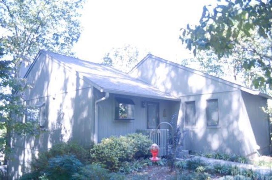 Must see this upgraded 3bed/2.5 bath condo in beautiful Victory Pointe. This condo offers extra parking and privacy with only one other condo attached. Well maintained and has had many updates...new carpet, water heater, hardwoods, deck and storm doors, roof, counter tops, light fixtures, extra insulation,paint, and remodeled downstairs bath. Upper level has 2 bedrooms and 1.5 baths, vaulted ceiling w/ fireplace in living roomm. Decks on upper and lower level. Downstairs enjoy huge room that could be used as family/media room. Large bedroom w/ private access to bathroom. Tons of closets/storgage areas. Live care free , and enjoy Victory Pointe's pool and tennis court.