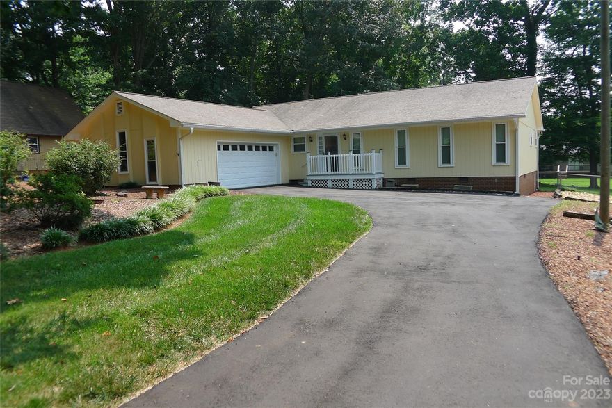 Complete with a 2-car garage and fenced back yard with a spacious deck, this 3 bed 2 bath just feels like home.  Large living room includes a wet bar while the primary bedroom features a walk in closet and private updated bath. All appliances stay. Book your appointment today!