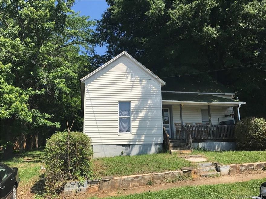 Price Reduced - Motivated Seller   Spacious home with wood floors. Home needs TLC and updates. Great for investor or home owner who wants a project to put their touch on. All bedrooms do not have closets.