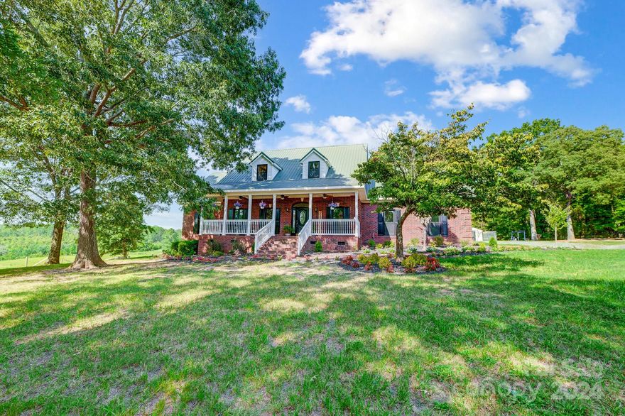 Charming 4-Bedroom Cape Cod Home on 12 Acres – Country Living at Its Best! Escape to the serene countryside with this beautifully updated 4 bedroom, 2 story all-brick Cape Cod home nestled on 12 picturesque acres, this property offers the perfect blend of modern comfort and rural charm. It offers four generously sized bedrooms with the primary on the main, a timeless all brick exterior with metal roof, and a kitchen perfect for home-cooked meals and gatherings. Venture outside to a large barn with four stalls as well as lots of room for tack, hay and storage and a double chicken coop ideal for raising poultry. Approximately 10 acres are mostly open and pastured! This beautiful property features gently rolling terrain, lush green grass, and expansive open spaces ideal for livestock grazing and farming. Enjoy peaceful country living with modern comforts. Whether you’re looking to start a small farm, have room for horses, or simply want space to breathe, this property has it all.