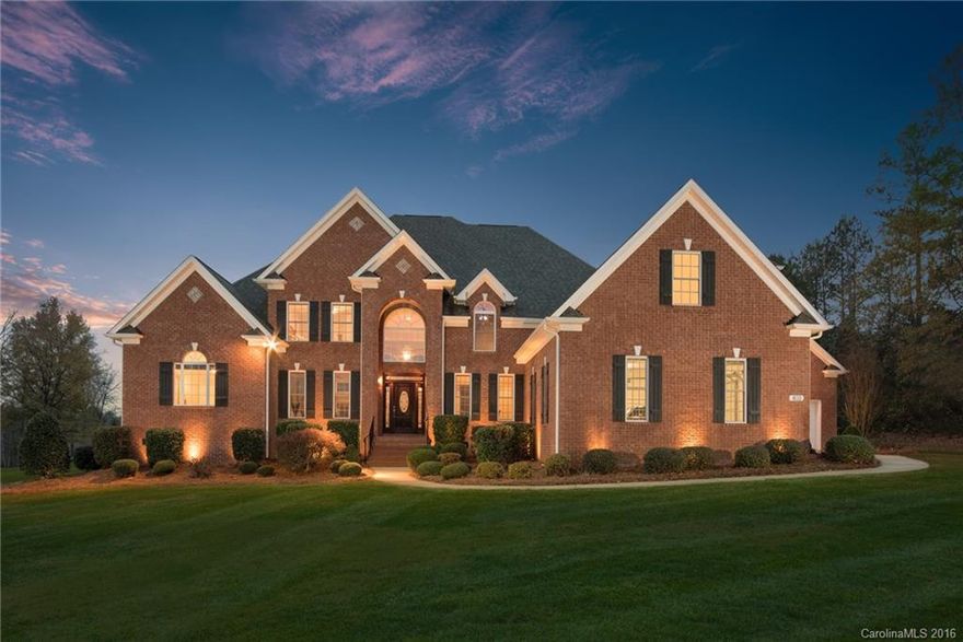 Stunning, spacious brick home. Luxurious master on main w/fireplace and his & her closets. Two-story great room w/fireplace. Formal Dining, Office space, exercise room, huge bonus room with theatre area. Mature landscaping w/full irrigation. 3-car attached garage and oversized, climate-controlled 2-car detached garage, perfect for the car or hobby enthusiast. Fenced backyard features in-ground salt-water pool with water falls, built-in grill. Whole house generator. Clover schools. Low taxes.