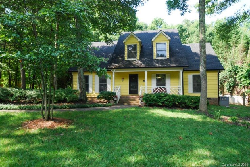 Gorgeous/private lot- Master bedroom suite on main floor- Huge bonus room- LR w/ built-ins & gas log fireplace - Oversize 2 car, side load garage- Huge deck w/pool- Fenced yard - Newer carpet - Acid stained concrete countertops in kitchen (very cool) - Newer pool liner - Spacious secondary bedrooms w/generous closets - Great storage - Laundry on 1st floor - Newer roof - Rocking chair front porch - Bright & cheery kitchen with island -  Formal dining room - Walk to middle and HS - Great location