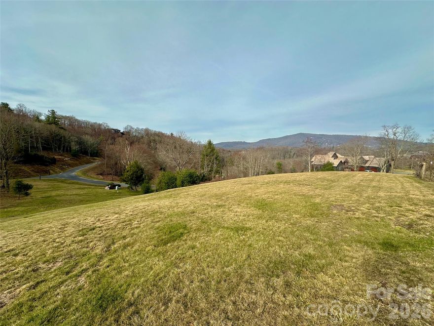 Build your dream mountain home in Firethorn, a premier gated community near Blowing Rock, NC, featuring sweeping Blue Ridge Mountain views—including a clear view of the Moses Cone Manor (Flat Top Mansion). This exceptional homesite offers southern exposure with plenty of opportunity for natural light, a spacious, usable yard, and a highly desirable setting across from the Firethorn clubhouse, pond, and community greenspace with hiking trails. The lot includes an active 3-bedroom septic permit and shared well water access, helping simplify the path to construction. Lot 203 also features an elevated, cleared and gently sloping building site. Enjoy the convenience of paved road access and the ideal High Country location with quick access to Blowing Rock, Boone, and the Blue Ridge Parkway—while remaining outside town limits and free of Blowing Rock town taxes. Firethorn residents enjoy 15+ acres of common area, a clubhouse, trout stream access, a pond, and hiking trails adjacent to protected National Park land along the Blue Ridge Parkway. Community guidelines include a preference for homes 4,000+ sq ft and no short-term rentals, supporting a quiet, residential mountain setting. Don’t miss this rare opportunity for a view lot in one of the High Country’s most sought-after communities.