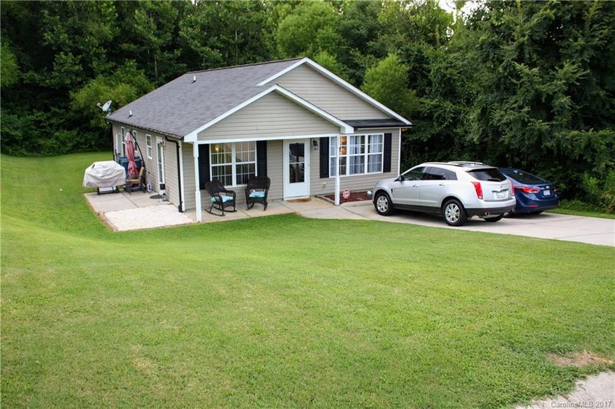 Fantastic ranch with brand new laminate floors! Immaculate home is in move in ready condition. Cathedral ceiling in living room and open kitchen/dining area gives the home a very inviting feel.  Master suite includes large walk in closet and private bath. Home is in USDA eligible area, so 100% financing is available!