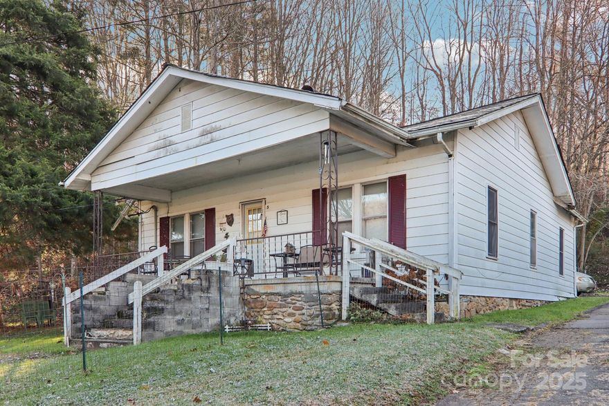 Is there a 3-bed bungalow in Waynesville under $150K? Yes—and it’s ready for transformation. This 1945 home offers 1,292 square feet on a deep 0.74-acre lot just minutes from Hazelwood and downtown Waynesville. With 3 bedrooms and 1 full bath, this property is being sold as part of an estate and is strictly as is. The foundation has settled in the back right corner, and the home will need extensive remodeling, system updates, and structural repair. There is no garage, but a driveway provides off-street parking. Conventional loans will not work—cash, 203K, or other rehab-friendly financing is required. There’s no HOA, and the lot offers a peaceful setting with potential for a full refresh or new vision. Zoned for Hazelwood Elementary, Waynesville Middle, and Tuscola High School in Haywood County. Just a few minutes to Walmart, restaurants, etc, and a quick drive to downtown, this is a rare chance to invest in location and land under $150K in town. Listed at $139,900. Contact us today to view and evaluate.
