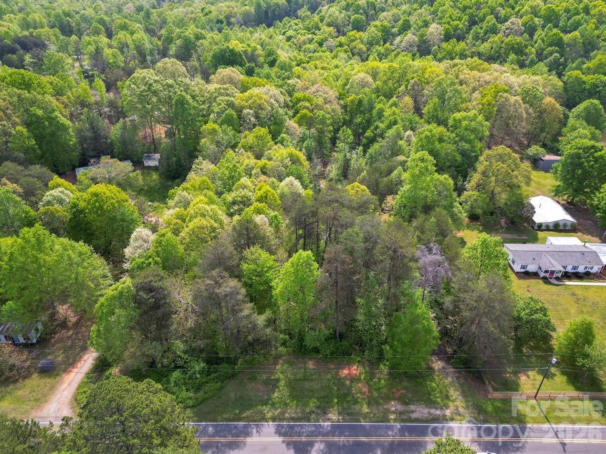 2.39 acres just outside of Troutman. Close proximity to downtown Troutman & I-77. No restrictions. No HOA. Bring your own builder! Modular and Manufactured homes ALLOWED! Can be subdivided for a max of two homes. Preliminary soil evaluation report complete and on hand.