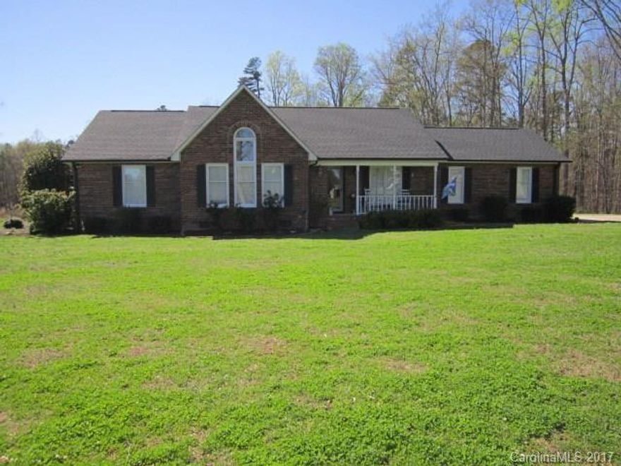 Fantastic opportunity to own over 6 acres. Full Brick. Freshly painted interior and crown molding. Beautiful hardwoods. Loads of storage space. Spacious Master bedroom with trey ceiling and walk in closet. Well maintained home. 3 Bay detached garage. Lift conveys. Air compressor does not convey. Paint booth is negotiable.
