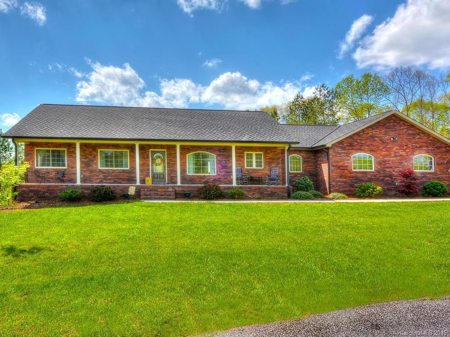 Country Living At Its FINEST & This home is straight out of HGTV! Almost 4 acres w/cul de sac lot & huge 3 car garage, gorgeous above ground POOL and woods galore! Home is almost 2,100 ft upstairs and another 2,300 downstairs (basement heated but not finished). You'll love the vaulted ceilings and all upgrades with granite, hardwoods, stainless appliances and more! Full walk out basement goes straight to your pool and large deck! Minutes from Troutman and The Lake! Come live the country life!
