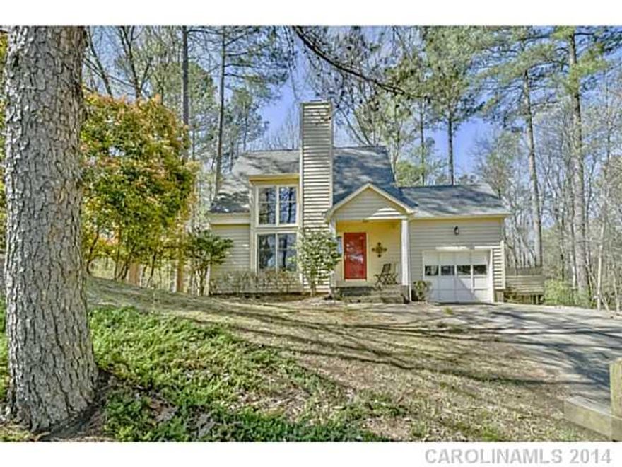 Newly updated, charming home on cul-de-sac street. Gorgeous custom stone wood burning fireplace and vaulted ceilings in Great Room. Eat-In Kitchen with spacious Dining Area. Master on Main with walk-in closet. New Pergo flooring throughout main living spaces and upper landing. Extra large deck to take in views of wooded yard. New heating, AC, thermostat, garbage disposal, and fixtures.