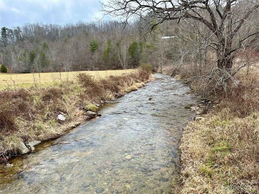 This amazing tract of land has so much to offer. A bold creek borders the north side for approximately 1800 feet. A large existing logging road system takes you easily to a dozen or more fine build sites. This is a fantastic property to team up with a bunch of friends and share. Power currently runs to two structures one on the east side and one on the west. Both are currently occupied and will most likely be updated or remodeled by whom ever invests in this fantastic large tract. The build sites all look back down on the meadow and creek shown in the pictures. The property resembles a stadium with the build sites all sitting like box seats. If you are looking for a property to build out for your legacy this one really should be carefully reviewed in person. The build sites are each spectacular and the logging road system needs some work but it is a great start and will save you thousands of infrastructure costs.