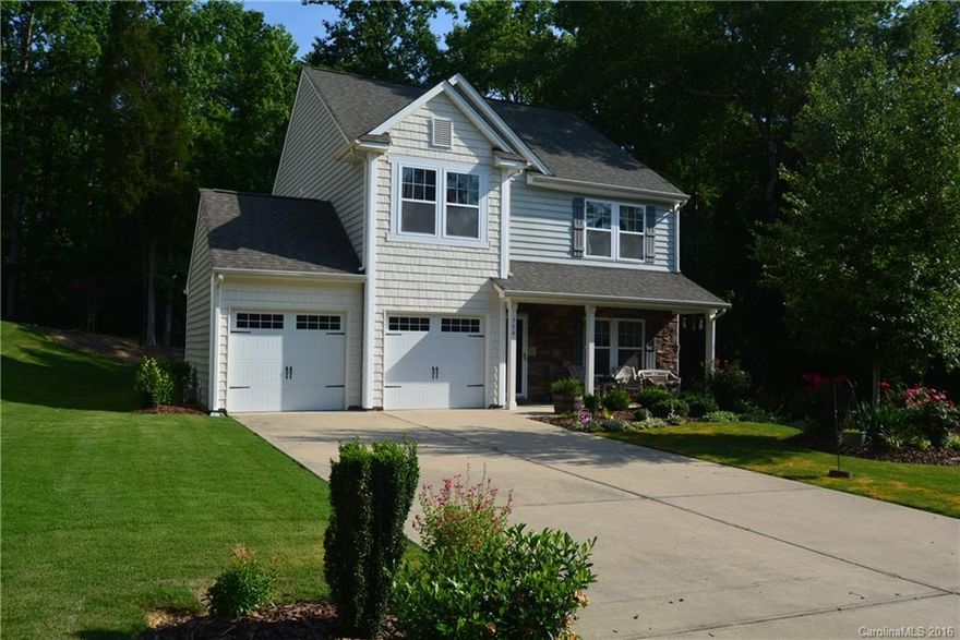 Well maintained 3 bedroom 3 1/2 bath home, with master downstairs and master upstairs! Hardwood floors throughout great room, dining, & kitchen. Ceramic tile in bathrooms. Stainless appliances. Large loft upstairs. Lots of storage throughout the house. Outside you'll find find beautiful entertaining spaces with a fire pit, a patio off of the back door, and an additional patio off to the side of the house, in a wooded setting. Beautiful and peaceful- neighbor only on one side.