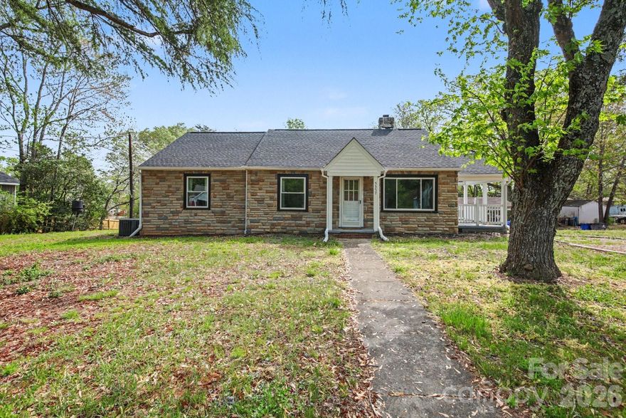 Major upgrades meet classic charm in this adorably renovated home! Move in with a new roof (2023), new windows (2023), and a new HVAC system (2022). The functional layout features the primary bedroom on the main level, alongside original refinished hardwood floors and a modern kitchen. Downstairs, the basement provides a dedicated space for a workshop, home gym, or storage. Situated on a nearly half-acre lot with a private screened-in back porch and deck, this home is a rare find where the heavy lifting has already been done for you.