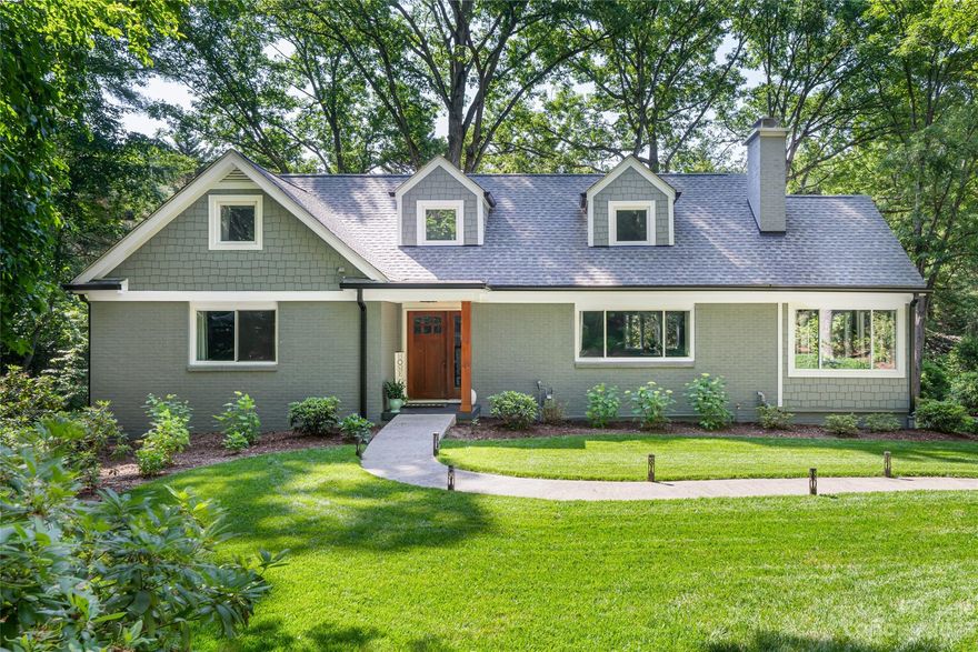 This inviting, move-in ready, completely renovated home offers an open floor plan with beautiful wood floors and large windows to frame this tranquil setting. Gourmet kitchen opens to the living room and dining area overlooking the beautiful backyard. A few steps to the sunroom allowing one to live harmoniously with nature. A main level primary with spa bath and walk-in closet. Upstairs you will find 2 bedrooms and a shared bathroom. On the lower level, a large den for additional living, gym or guest suite if you prefer, with a kitchenette, and a full bath. The outdoor living is equally captivating, featuring a private patio and a firepit. Green space and canopy trees throughout the 0.65-acre property, creating a peaceful setting just moments away from shopping, restaurants and Downtown Asheville. With a stunning combination of fine craftsmanship and breathtaking exterior beauty, 44 Forest Road is an exceptional residence within the coveted Biltmore Forest and South Asheville.