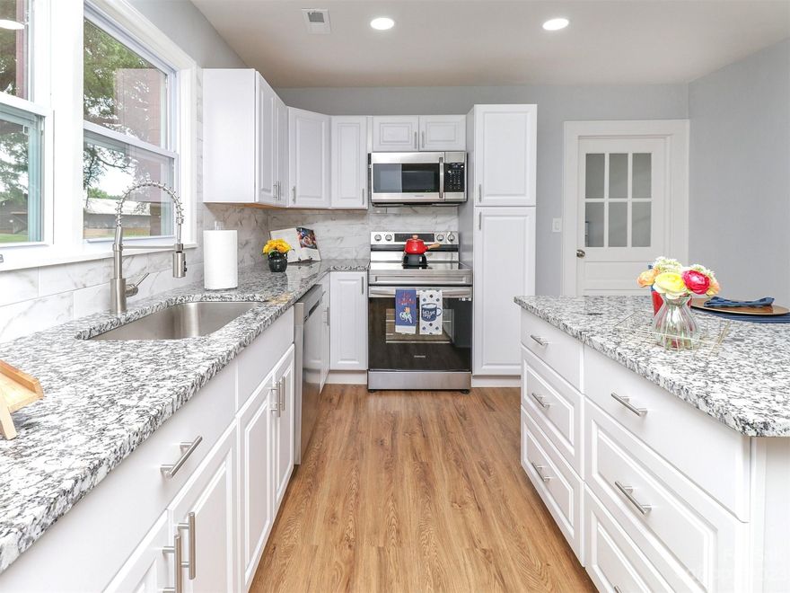 Great location in Lincolnton!!! This home is move in ready completely remodeled. Great open floor plan, New Kitchen w/lots of cabinets & counter-top space, kitchen island, beautiful granite & back splash, New Appliances, Luxury plank flooring throughout the house 100% waterproof, new paint, smooth ceiling, light fixture, new windows, all exterior refreshed, both bathrooms total renew, better than getting a new home. Property sits on 0.62 acres large lot with shed for storage. No HOA. Great place for people to live no more than 10 min away from Lincolnton Downtown with easy access to 321 business & 321 bypass. Shopping, dining, & entertainment in Lincolnton, NC ~~This home is a must see!!!