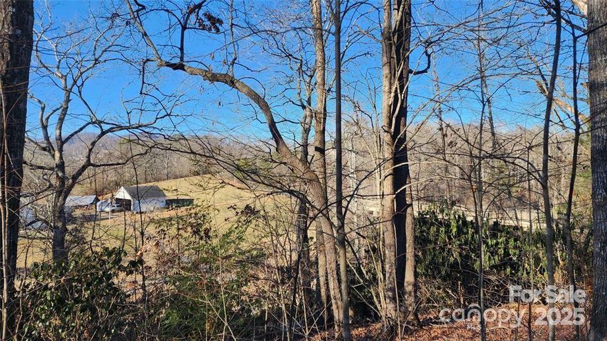 New 2 Bedroom septic installed and city water, ready to start building now "NO RESTRICTIONS" with freedom to build an develop your property waits for you here! You have the potential to wake up to awe inspiring vistas of the surrounding mountains with a picturesque backdrop here from your new home. Enjoy private access from your own property to Beaverdam Creek.   Embrace the perfect blend of nature and convenience with this unique property consisting of two parcels.  Whether you are looking to build your mountain retreat, or investment this land offers endless possibilities.