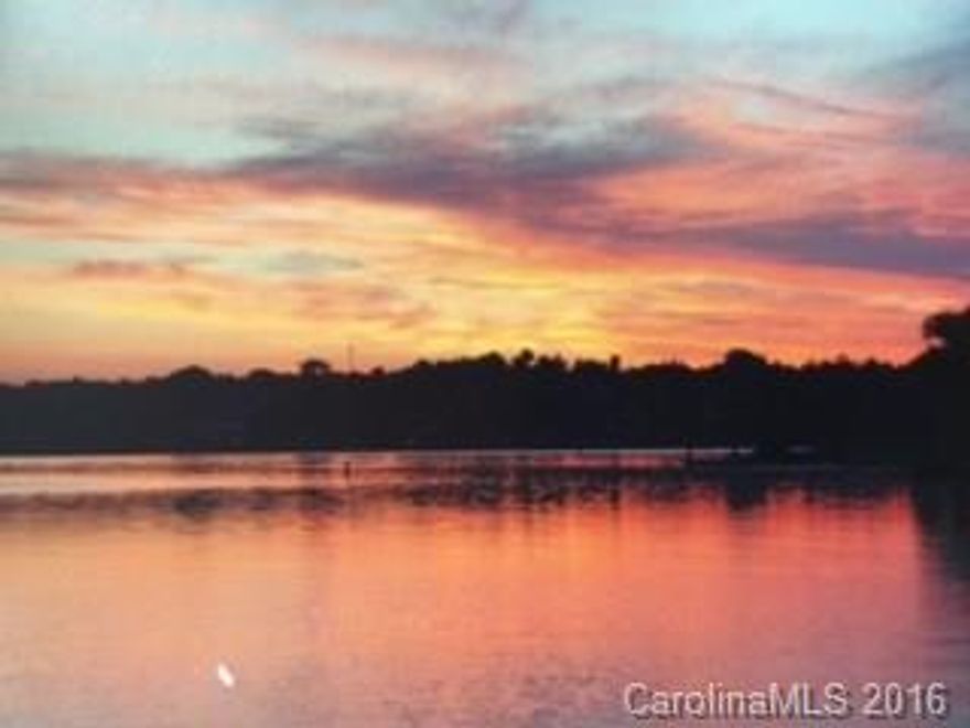 Wake up every morning to expansive breath taking view of the sunrise reflection on the water, relax in your sun room and take in the beautiful sunset in the evening and lull yourself to sleep with the beauty of the moon reflecting across the water all from the privacy of your waterfront home!  Don't miss the opportunity to have a serene permanent home or vacation home at "The Lake Club" on Lake Wylie in Rock Hill, SC.