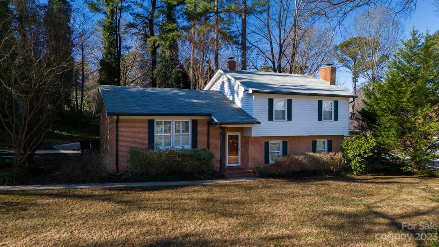 Nestled in the charming Swan Meadows neighborhood, welcome to your new home! This spacious 4-bedroom, 2.5-bath residence sits on a generous 0.55-acre lot. The main level boasts an open floor plan with a great room, kitchen, and dining area, creating a perfect hub for family gatherings. On the lower level, you'll find a cozy den with a fireplace, an additional bedroom, and a full bath, providing a private retreat. Upstairs features three bedrooms and 1.5 baths. A breezeway connects the oversized 2-car garage for added convenience. Enjoy the benefits of no city taxes while remaining close to shopping, dining, and the interstate. The property also includes a storage building for your convenience.