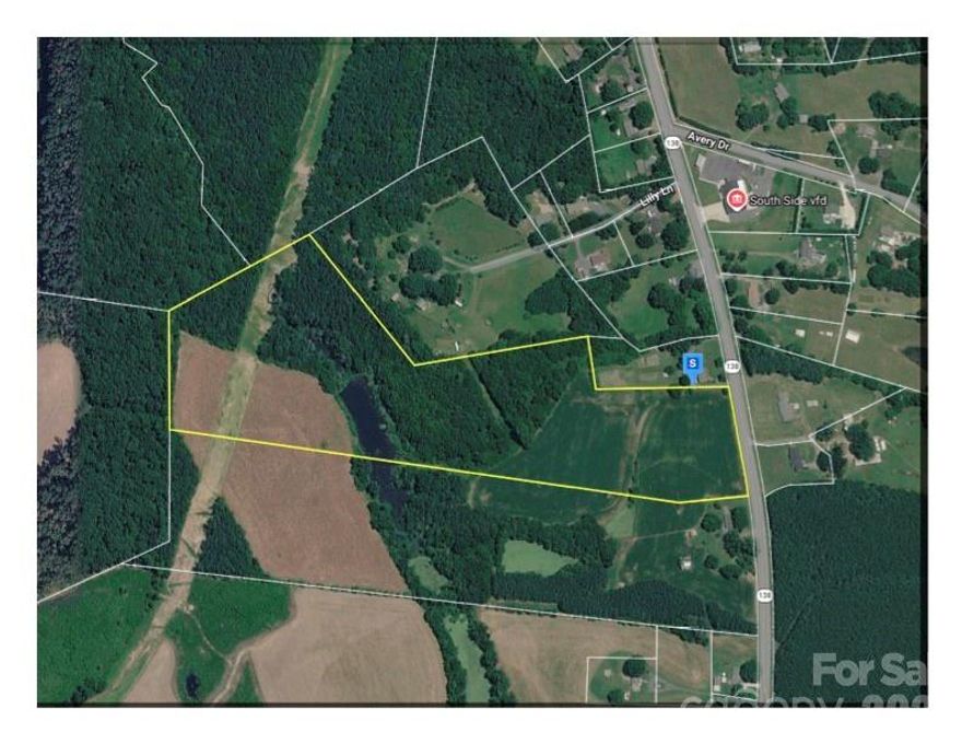 Beautiful 25 acre tract featuring gently rolling open pasture across the front, which is ideal for a home, farming, or horses, with a backdrop of mature timber offering privacy and natural beauty.  A small lake/pond enhances the setting. Perfect balance between open space and wooded seclusion makes it great for a private  or country retreat.
Field in the rear is in the AG program, and is currently planted in crops  - but could easily be converted to pasture for horses.  The wooded section provides space for walking trails and/or hunting.