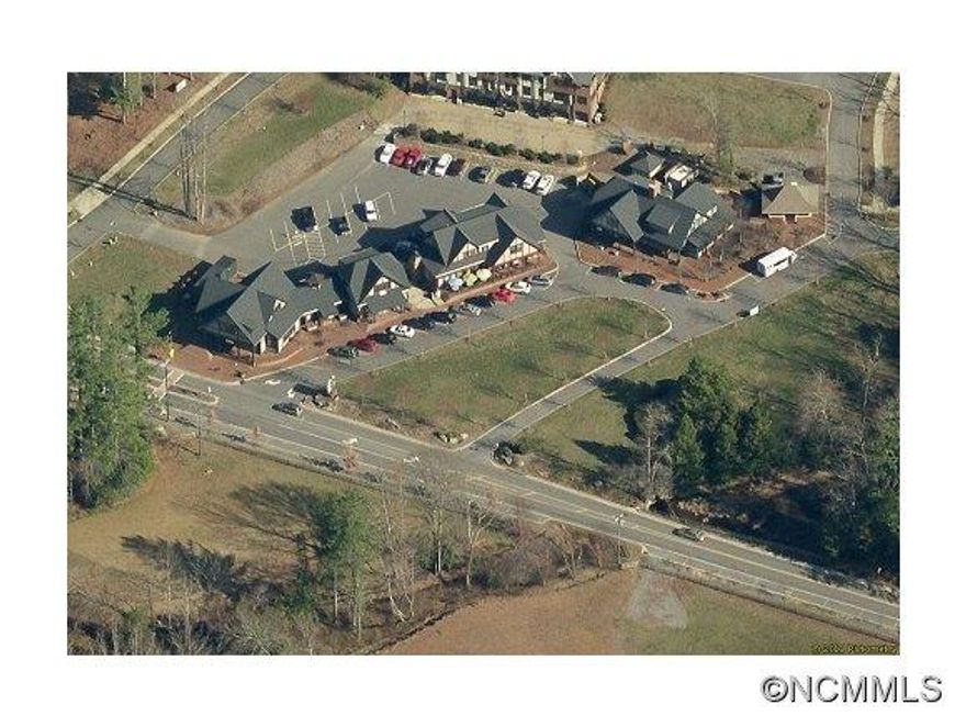 Investment opportunity in the beautiful upscale Village of Cheshire, a mountain community in Black Mountain, North Carolina. This offering consists of four buildings which are also offered separately for a total price of $2,142,000. Proforma cap rate at full occupancy is 10.0. Tenants include gourmet market/cafe, coffee/wine, upscale hair salon, restaurants, general office, and apartments. Cheshire is a mixed-use community with health club.