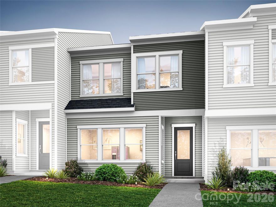 Welcome to 6315 Haller St, a 3-bedroom, 2.5-bath townhome with a covered front entry, fenced front yard, and 2-bay rear-load garage designed for easy, everyday living. The open-concept first floor is anchored by a chef-inspired kitchen featuring white cabinetry, white quartz countertops, white subway tile, a large single-bowl stainless steel sink with a Delta Essa Touch faucet, and a GE 30" freestanding electric range — plus tucked-away storage under the stairs. Upstairs, a loft sets the tone before leading to all three bedrooms, including a primary suite with a walk-in shower with tiled walls, white cabinetry with drawers, white quartz countertops, and a walk-in closet. A dual-vanity secondary bath, upper-level laundry room, and LivingSmart features, WiFi switches, HomeSmart thermostat, prewired ceiling fans, and a Ring doorbell, round out the home. All of this at Amplitude, a thoughtfully located townhome community offering bright, airy interiors, low-maintenance living, and easy access to Uptown in one of Charlotte's most exciting and fast-growing corridors.