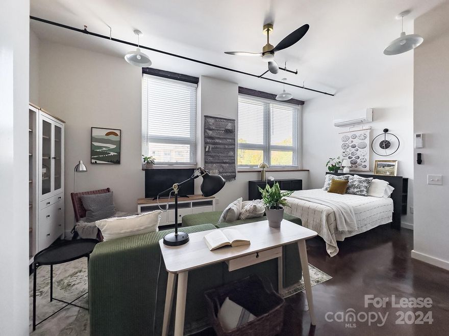 Discover the charm of The Old School Apartments, a historic Junior High school turned modern living space in downtown Morganton's arts district, across from COMMA. Choose from spacious studio and one-bedroom apartments that blend historic character with contemporary amenities.

Why You'll Love This Studio Apartment:

Soaring Ceilings & Natural Light: High ceilings and large windows bring in abundant natural light.
Modern Comforts: Full kitchen with all appliances, in-unit washer and dryer, and included water, sewer, and gas.
Efficient Living: New mini-split HVAC keeps energy bills low; tenants only pay electricity, trash, and internet.
Security & Convenience: Gated parking, keyless entry, and hallway storage for seasonal items.
Renovation Specials: Construction will occur during normal business hours, and our special rates reflect this. Lock in your rate today!
Email for details: rentals.foothills@gmail.com